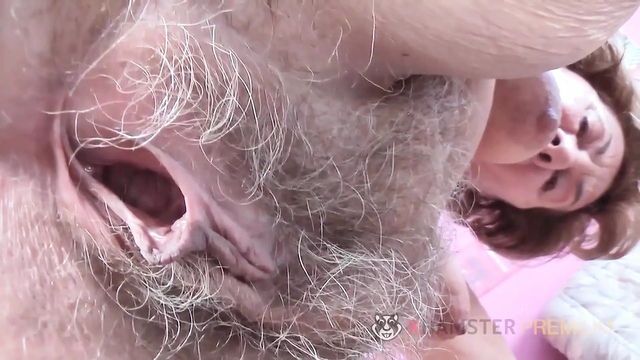 Horny granny fingering and rubbing her hairy pussy Part 1